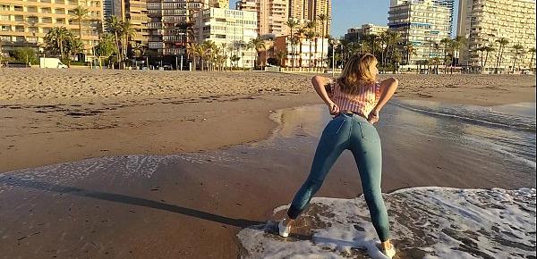  Wet shoot on a public beach with Crazy Model. Risky outdoor masturbation. Foot fetish. Pee in jeans.